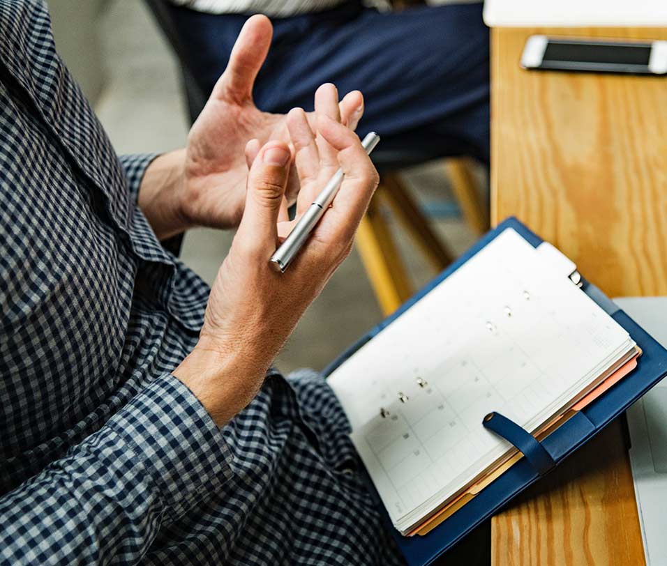 Business law attorney reviewing contract for SLO County company 93401